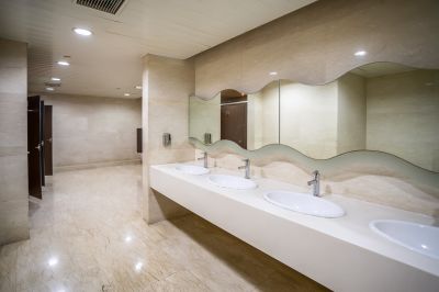 Bathroom with Marble Vanity and Lighting